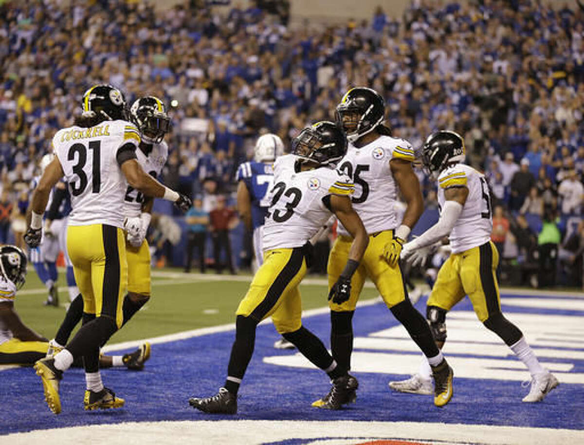 Pittsburgh Steelers' Mike Mitchell (23) celebrates with teammates after breaking up a touchdown pass during the first half an NFL football game against the Indianapolis Colts, Thursday, Nov. 24, 2016, in Indianapolis. (AP Photo/Michael Conroy)