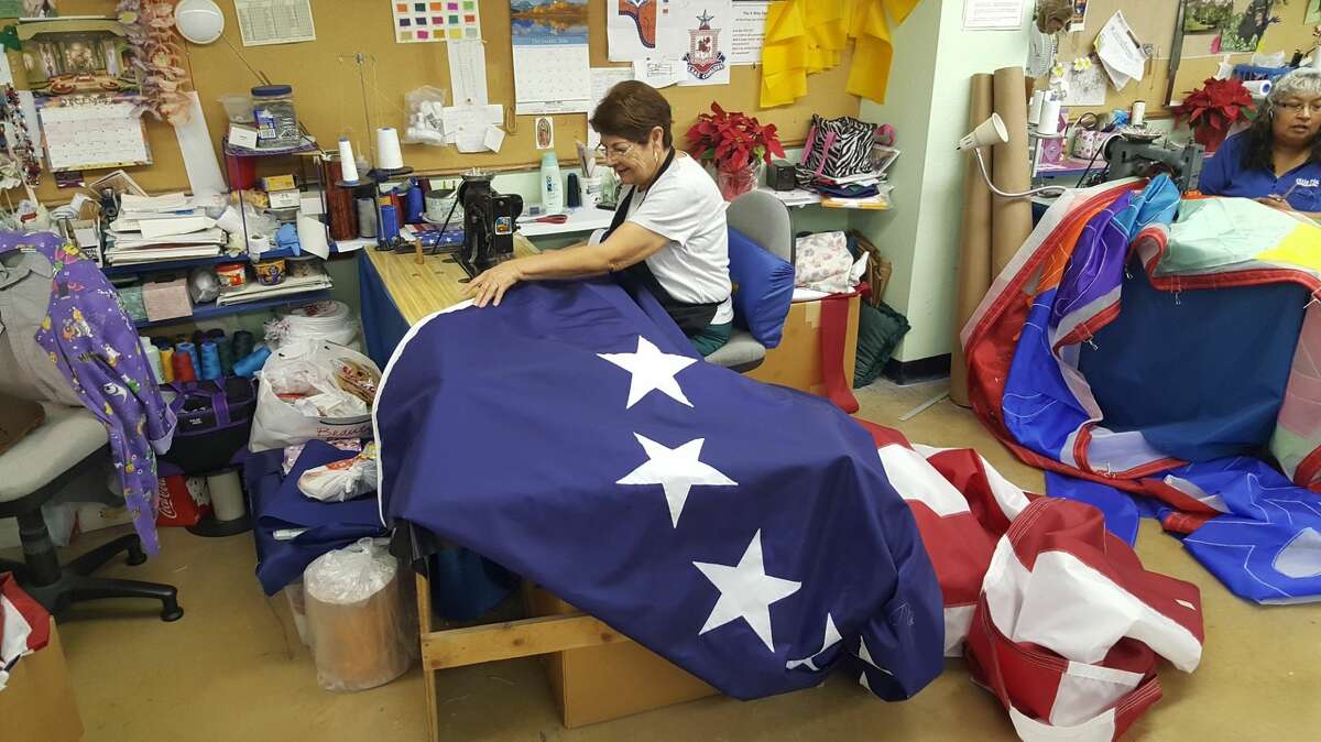 Dixie Flag Manufacturing Company working to finish flags for President-elect Donald Trump's inauguration on Jan. 20, 2017.