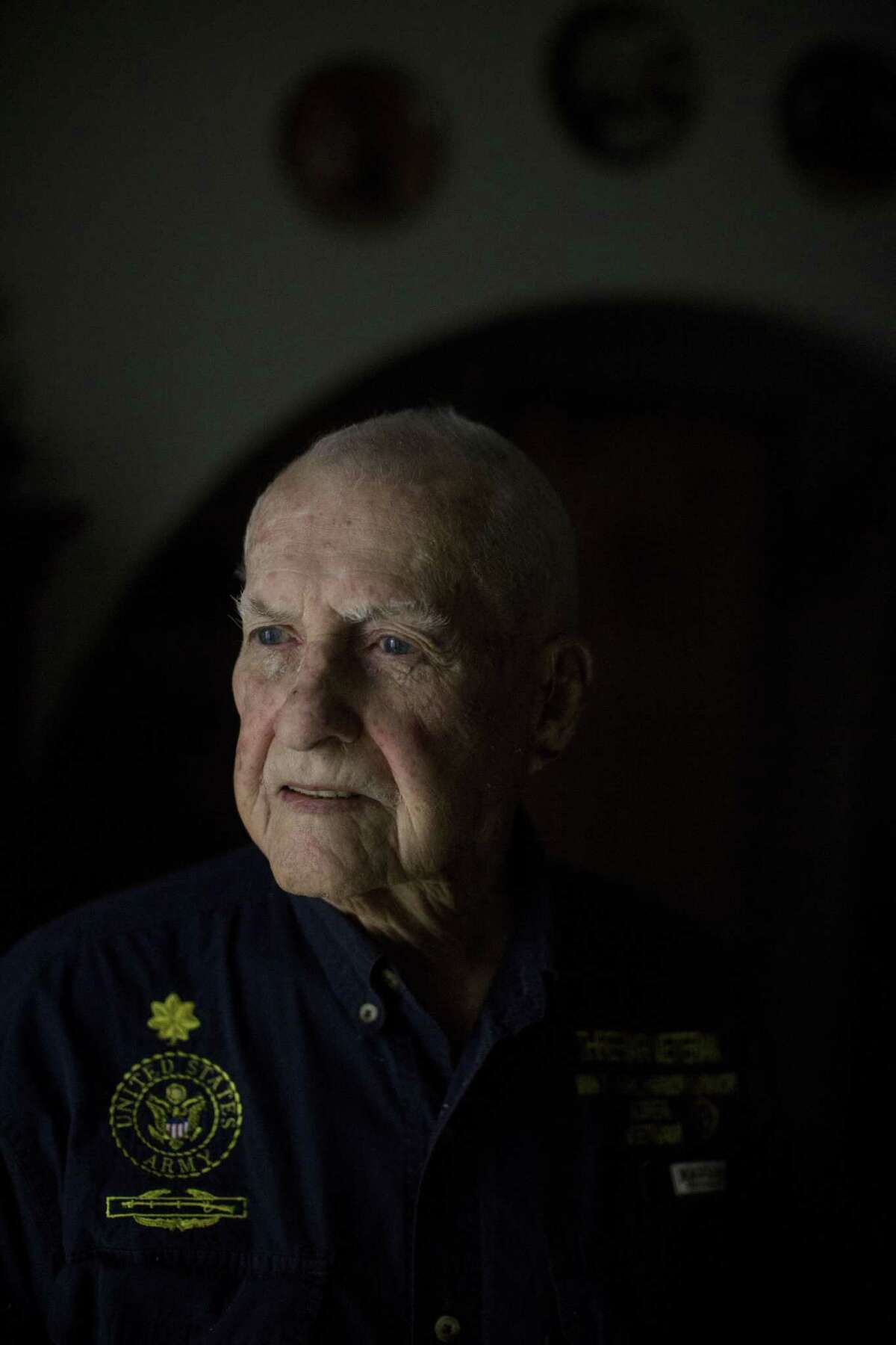 Virgil Lee Ward, a 95-year-old veteran who was stationed in Hawaii during the attack on Pearl Harbor, stands for a portrait in his home in San Antonio, Texas on December 1, 2016.
