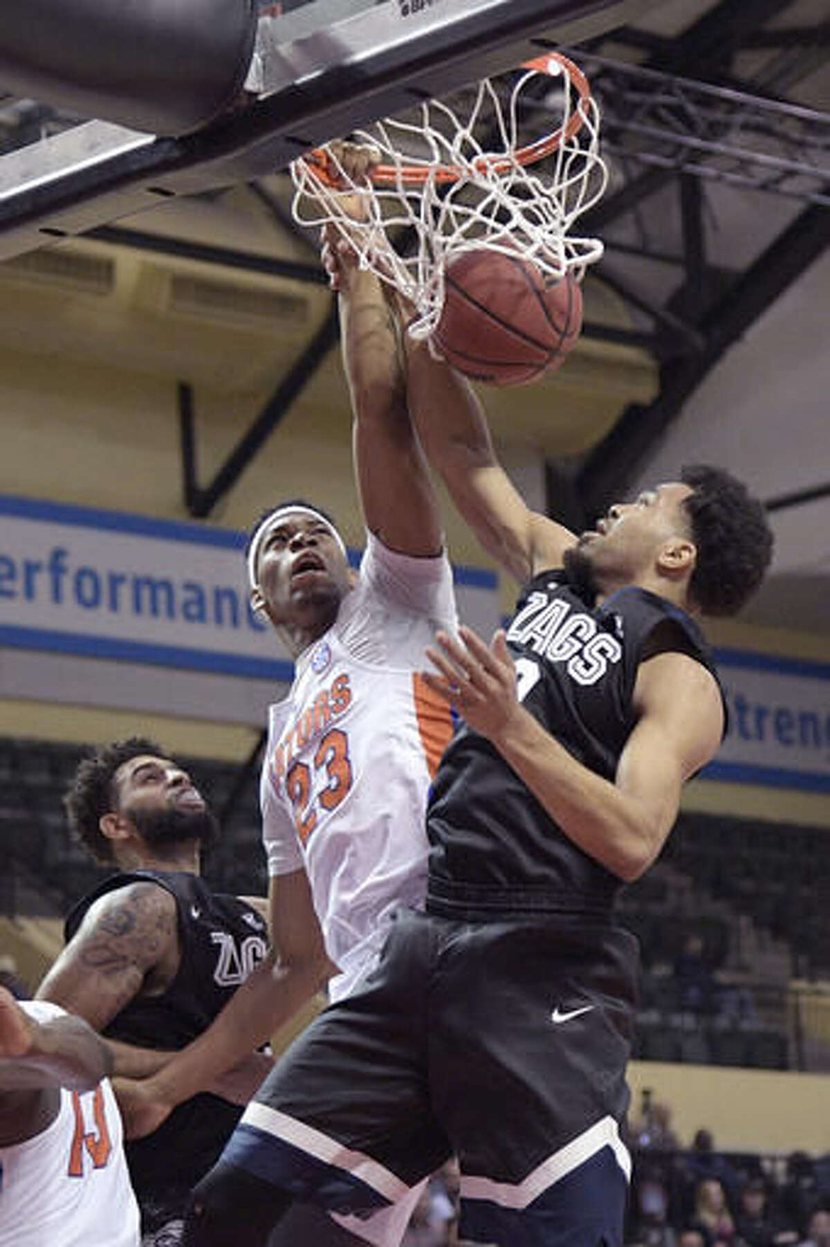 Perkins, Melson help No. 11 Gonzaga top Florida 7772