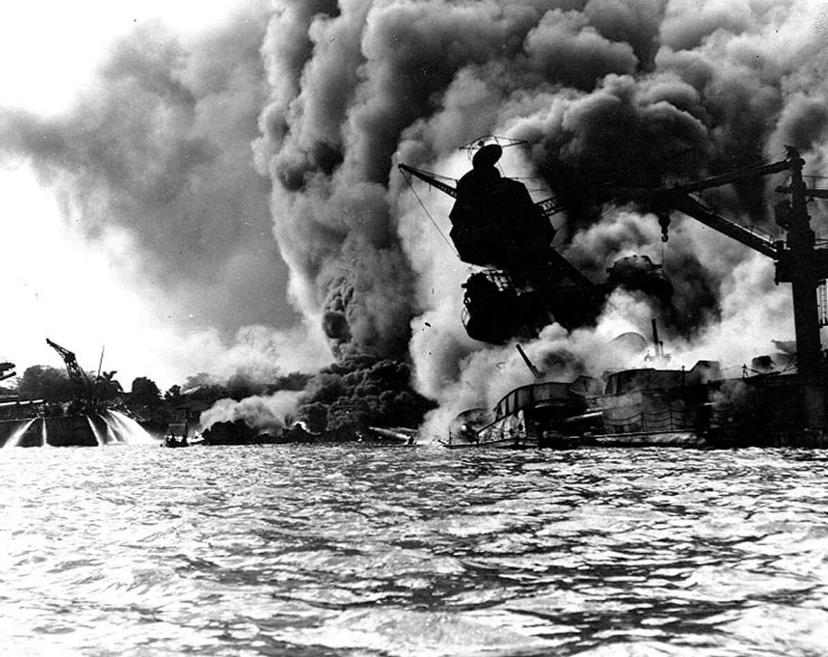 Greenwich resident Norm Burger was a little boy in Hawaii when the Japanese attacked Pearl Harbor back on Dec. 7 1941. He could view the chaos from a distance from near his family's hillside home. Here, smoke billows from the U.S.S. Arizona after it struck by Japanese bombs.