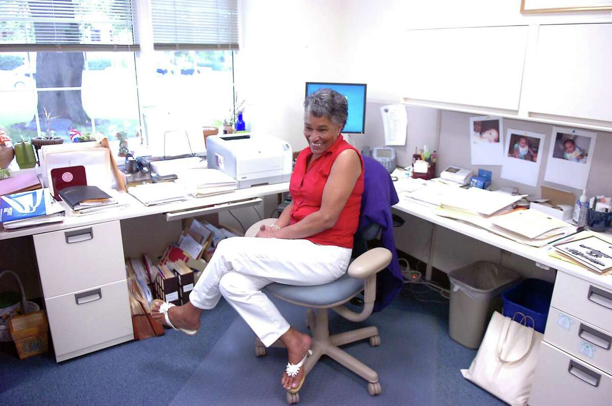 Charlene Abdal in her Town Hall office in 2009, retiring after 33 years with the town and serving as an executive assistant to some 12 First Selectman. She died Sunday after a long illness.