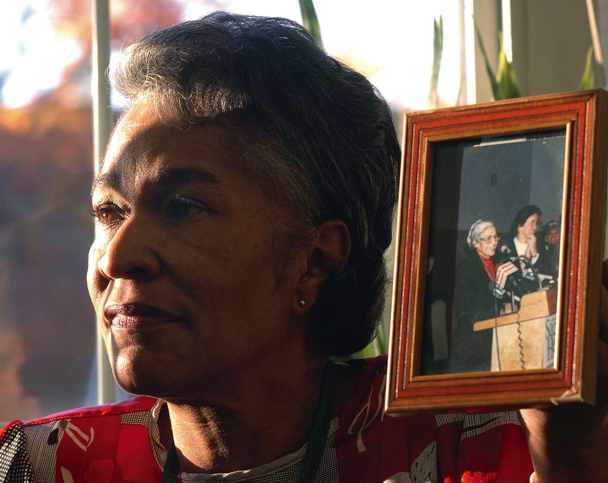 Charlene Abdal , Executive Assistant in the Selectman's office for the Town of Greenwich, posed at Greenwich Town Hall with a photo of Rosa Parks when Parks came to talk to students at Greenwich's Convent of the Sacred Heart in 1995. She died Sunday after a long illness.