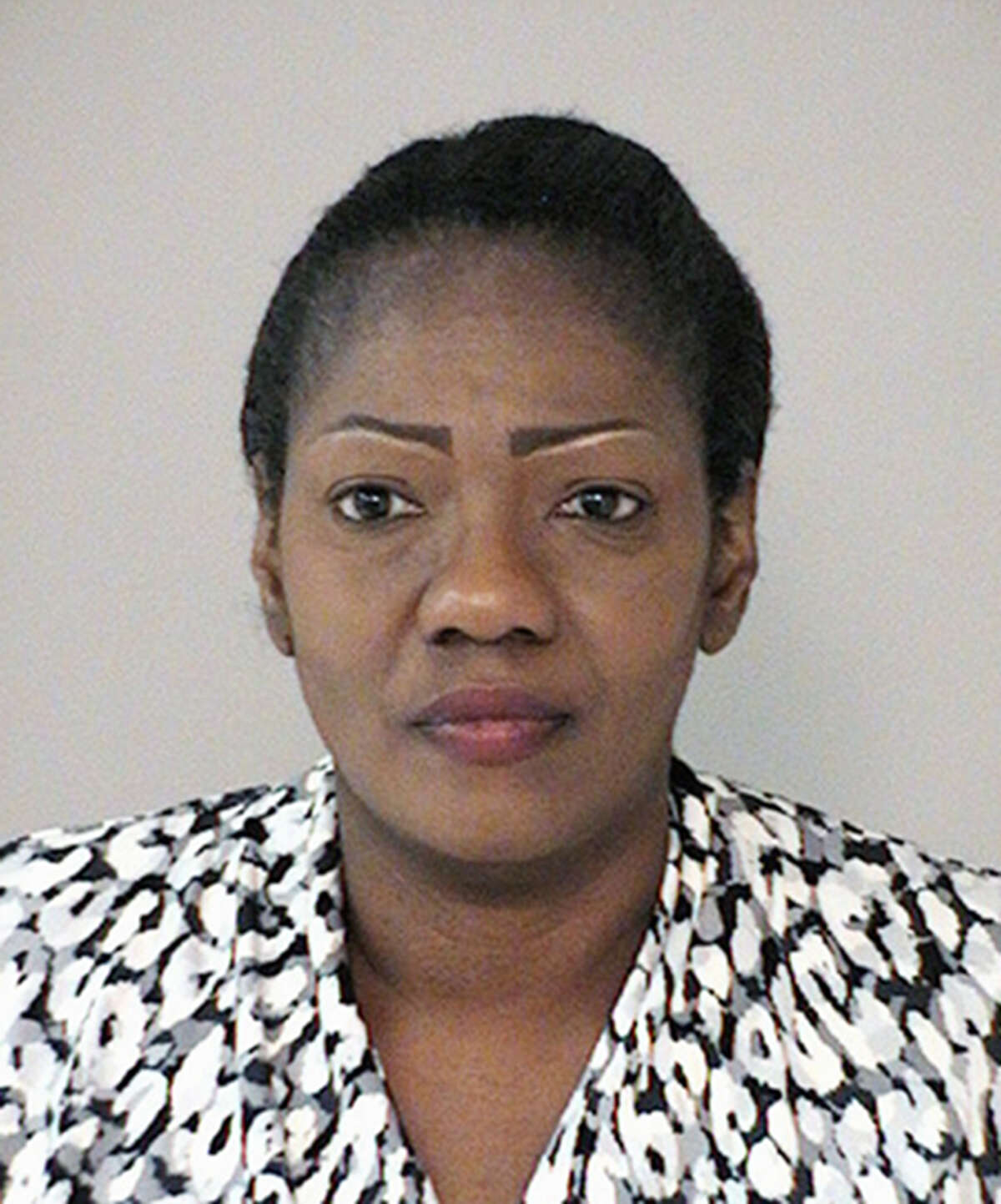 This undated photo provided by the Fort Bend County Sheriff's Office in Richmond, Texas, shows Paula Sinclair, who was charged Tuesday, Dec. 6, 2016, with injury to a child and aggravated kidnapping. A sheriff says seven special-needs teenagers aged 13 to 16 years old were removed Nov. 23 from "deplorable" conditions at the Houston-area home where they were locked for long periods in a closet by Sinclair, their adoptive mother. (Fort Bend County Sheriff's Office via AP)