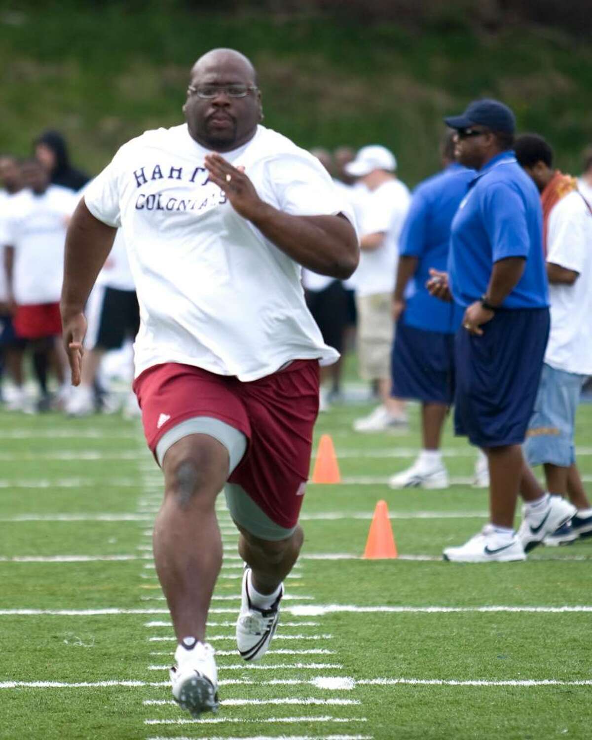 Former UMass-Amherst offensive lineman David Thompson runs the 40 at the Hartford Colonials' tryout Saturday at Immaculate High in Danbury.