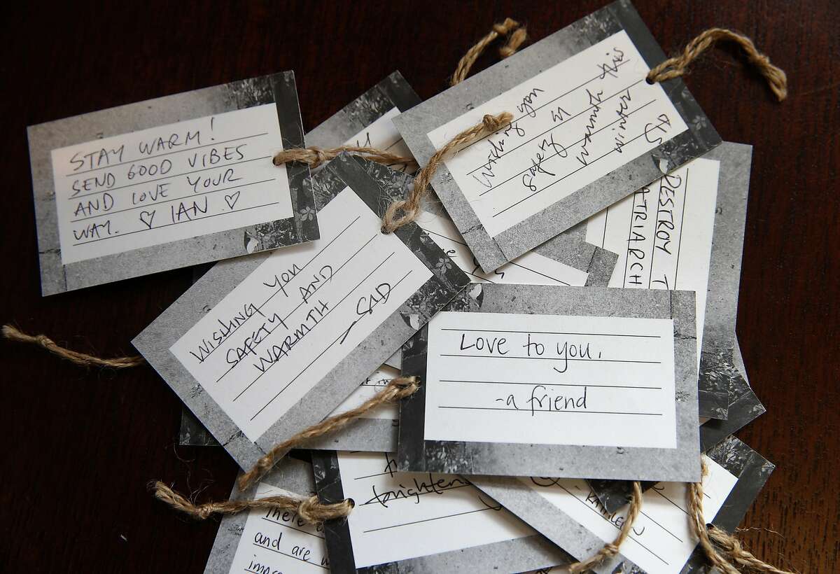 Personal messages written by customers and to be distributed to homeless recipients are displayed at the Crack and Cider pop-up store inside the Tenderloin Museum in San Francisco, Calif. on Wednesday, Dec. 7, 2016. People wanting to buy useful items for homeless individuals can purchase the product which are then distributed by the Hospitality House organization to their clients.