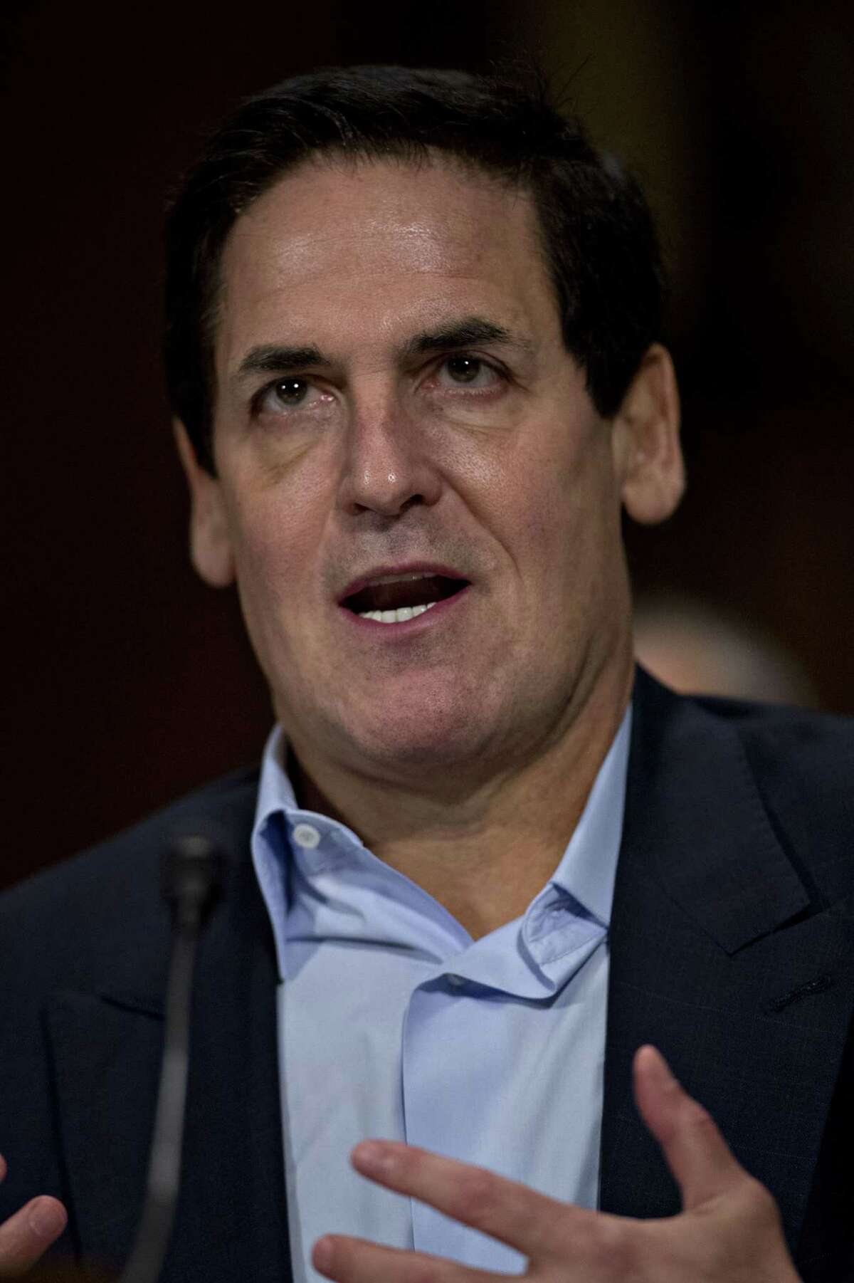 Mark Cuban, billionaire owner of the National Basketball Association's (NBA) Dallas Mavericks basketball team and chairman of AXS TV, speaks during a Senate Judiciary Subcommittee hearing in Washington, D.C., U.S., on Wednesday, Dec. 7, 2016. AT&T Inc. Chief Executive Officer Randall Stephenson told Congress his company's planned $85.4 billion purchase of HBO and CNN owner Time Warner Inc. will help the telecommunications provider challenge cable companies for customers. Photographer: Andrew Harrer/Bloomberg