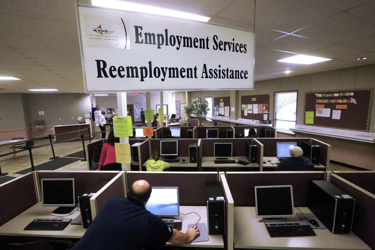 The Labor Department said weekly claims for jobless aid slid by 10,000 to a seasonally adjusted 258,000. The less volatile four-week average rose by 1,000 to 252,500.