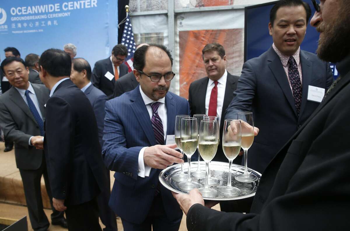 Champagne is served to guests to celebrate the groundbreaking for the 910-foot, 61-story Oceanwide Center in San Francisco, Calif. on Thursday, Dec. 8, 2016. When completed in 2021, the residential and office tower on First Street will be the second tallest building in the city.