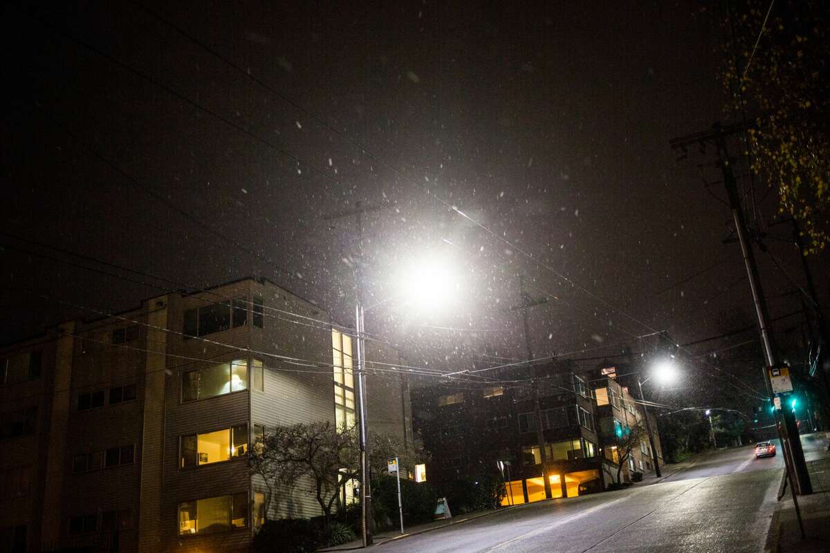 Snowy roads slick around Seattle; schools closed, delayed
