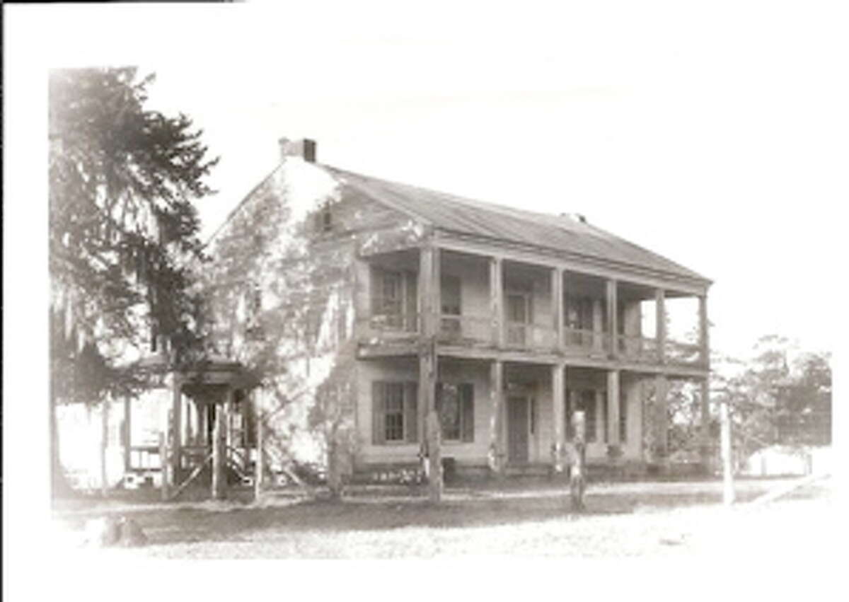 The Elmwood plantation home on the Lewis property three miles west of Willis pictured in the 1800s. The home was built by Gen. John Lewis, the last Secretary of State for the Republic of Texas. The home fell into disrepair and was eventually torn down to be used for lumber. The Lewis land is now covered by the Lewis Creek Reservoir.