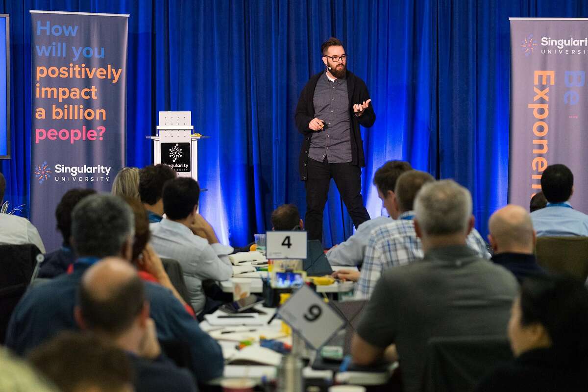 Kyle Nel addresses attendees of Singularity University in Mountain View, Calif. on Friday, Dec. 9, 2016. The university is an executive-education program that focuses on ideas that will change the world.