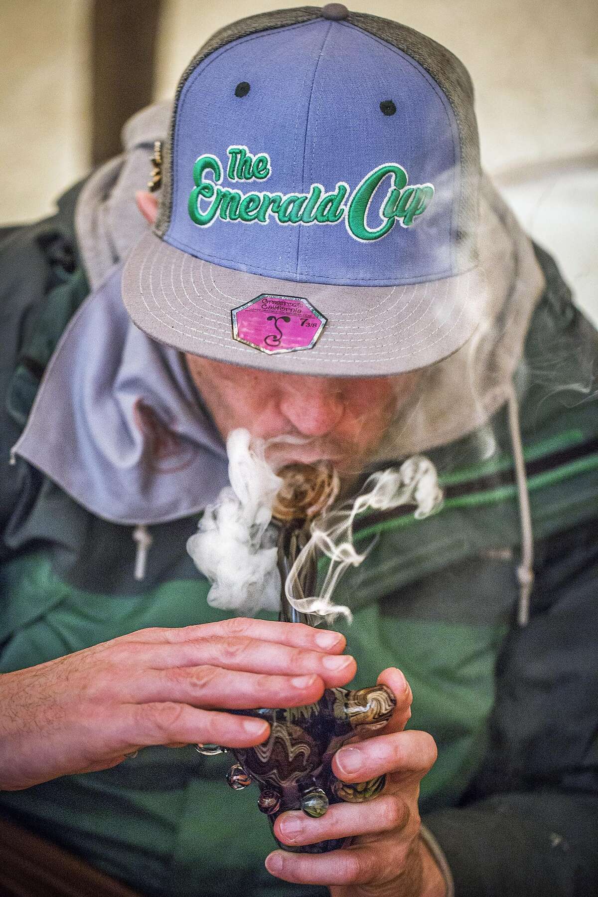 Zelly Rock takes a hit of weed inside a teepee Saturday, Dec. 10, 2016 in Santa Rosa, CA at the Emerald Cup -- a 30,000 person cannabis county fair; the world's largest. This is the first big pot party since Prop 64 has passed, ad out angle is focusing on the newcomers to the massive, sprawling event.