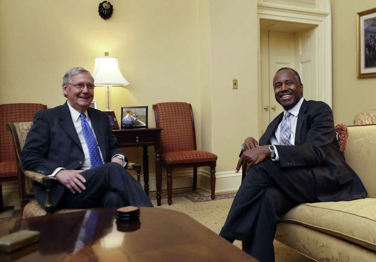 Senate Majority Leader Mitch McConnell (left) meets with Ben Carson, HUD secretary nominee, on Capitol Hill. A reader defends Carson, who has no experience in government.