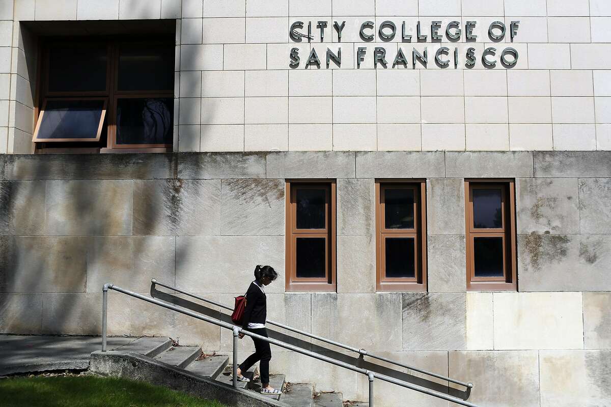 Claudeen Narnac walks down the steps in front of a City College of San Francisco in San Francisco on July 3, 2013.