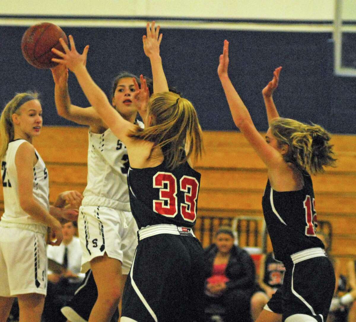 Action from Staples' 43-28 win over New Canaan on Monday.