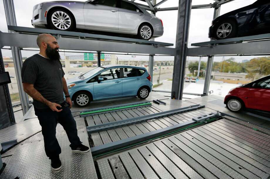 New Carvana tower aims to make car buying 'fun' Houston Chronicle
