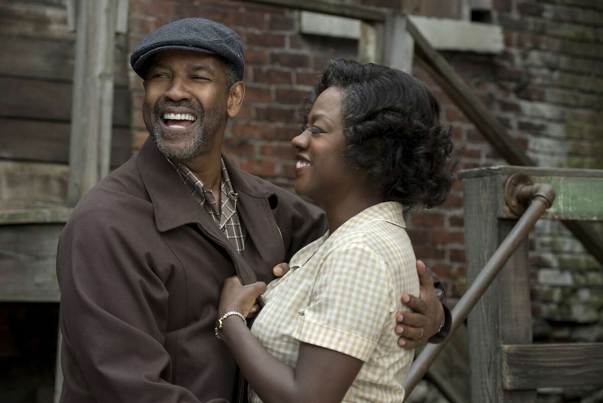 This image released by Paramount Pictures shows Denzel Washington, left, and Viola Davis in a scene from, "Fences." On Wednesday, Dec. 14, 2016, Washington was nominated for a Screen Actors Guild award for outstanding performance by a male actor in a leading role for his role in the film. Davis was also nominated for outstanding performance by a female actor in a supporting role. (David Lee/Paramount Pictures via AP)