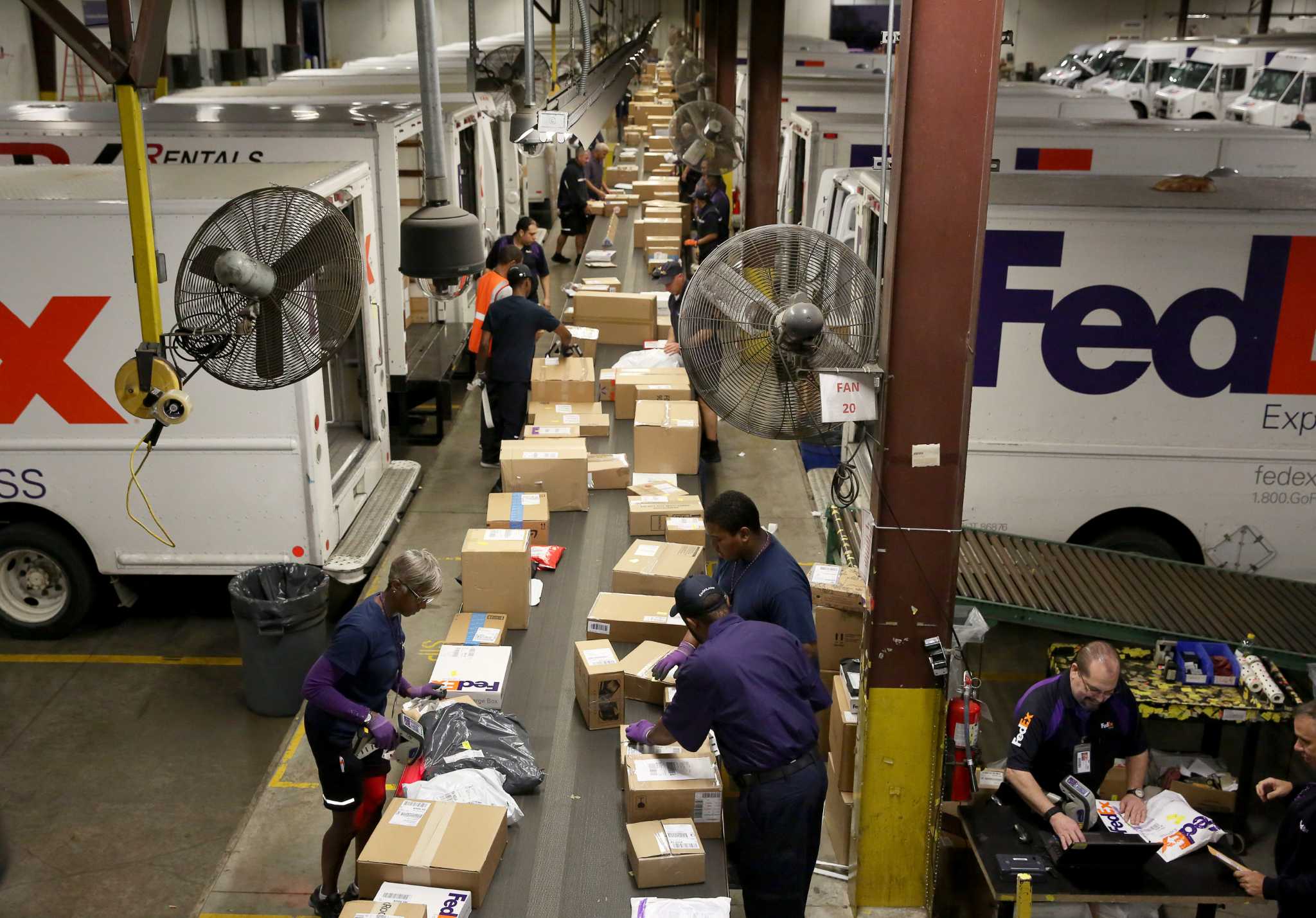 fedex-workers-race-to-meet-record-demand