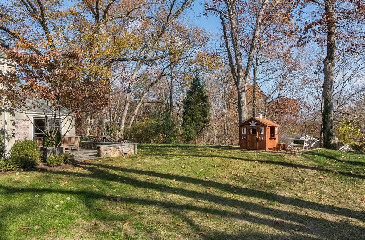 North Stamford log cabin home offers rustic charm