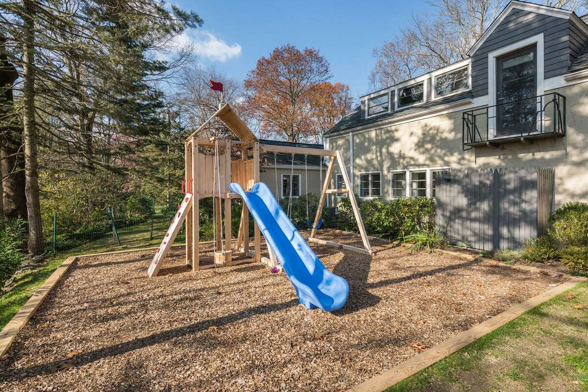 North Stamford log cabin home offers rustic charm