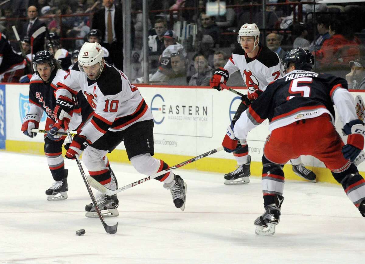 Albany Devil Rod Pelley looks to pass during their game against Hartford at the Times Union Center on Tuesday March 29, 2016 in Albany, N.Y. (Michael P. Farrell/Times Union) ORG XMIT: MER2016121514384353