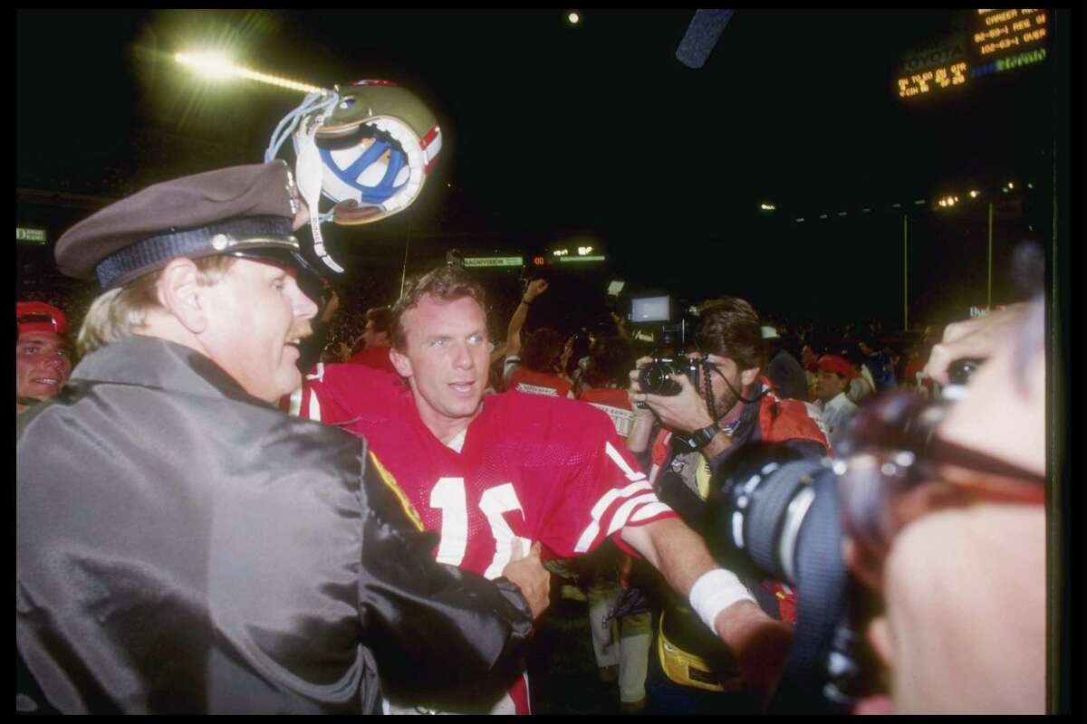No. 1: 'Hey, isn't that John Candy?' The game: Super Bowl XXIII The date: Jan. 22, 1989 The setting: Joe Robbie Stadium, Miami Gardens, Fla. The protagonists: Joe Montana, Jerry Rice, John Taylor The circumstances: With 3:10 left in the game, Cincinnati was leading 16-13 after Jim Breech's 40-yard field goal. San Francisco had taken over, first-and-10, at its 8-yard line following a half-the-distance penalty on the kickoff return. The moment: Trying to settle his teammates down before they broke from the huddle, Montana turned to tackle Harris Barton and called his attention to a familiar face in the stands. "Hey," he said, "isn't that John Candy?" Super Joe then drove the 49ers 92 yards, rifling the winning 10-yard touchdown pass to Taylor with 34 seconds left. With 1:15 showing on the clock, the Niners had been facing a second-and-20 near midfield before Montana and Rice conspired to doom the Bengals for a second time in the Super Bowl. On a day when Rice would finish with 11 receptions for 215 yards and claim MVP honors, the most prolific receiver in NFL history snared a tightly threaded Montana ball over the top and high-stepped past three would-be Cincinnati tacklers, picking up 33 yards to the 18. Montana next found Roger Craig for a gain of 8 before Taylor, beating single coverage on a post pattern, scored the winning points. The upshot: With their third Lombardi Trophy in nine seasons and having won the most dramatic Super Bowl yet played, Bill Walsh's 49ers secured their legacy as one of the NFL's greatest teams. Just for fun, they added a fourth title under George Seifert the following season, routing the Denver Broncos 55-10 in Super Bowl XXIV.