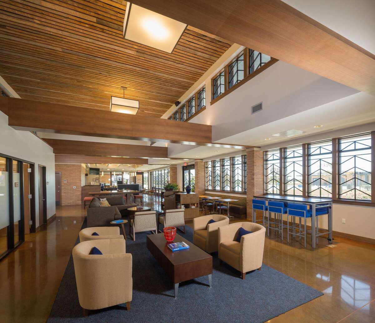 Rorick House, the 9,000-square-foot amenities center at Elyson, has areas for lounging, community meetings and games.