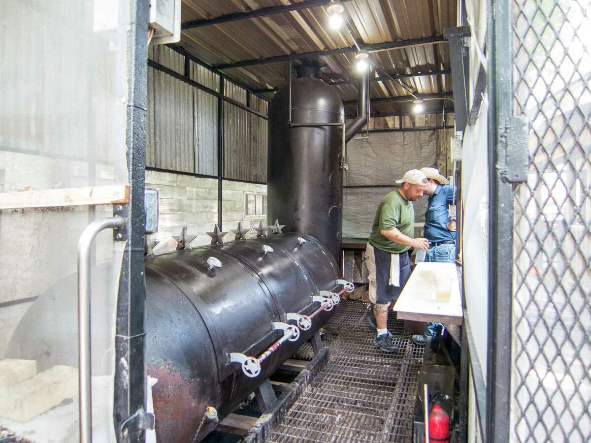 Tejas Chocolate Craftory uses an offset barrel smoker, an example of a manual barbecue pit.