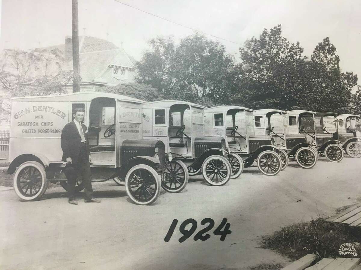 George H. Dentler is shown in 1924 with a row of his potato chip delivery trucks. Dentler Maid Potato Chips were sold in stores and directly to consumers from 1910 to 1962.