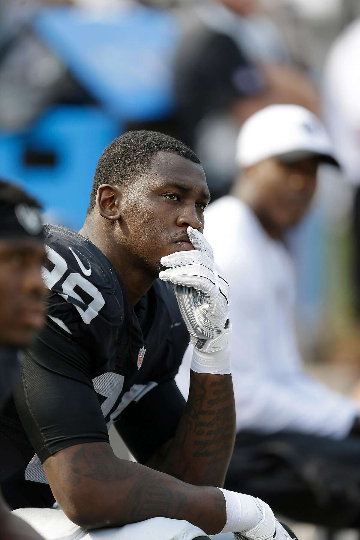 Oakland Raiders linebacker Aldon Smith (99) sits on the bench during the second half of an NFL football game against the Cincinnati Bengals in Oakland, Calif., Sunday, Sept. 13, 2015. (AP Photo/Ben Margot)