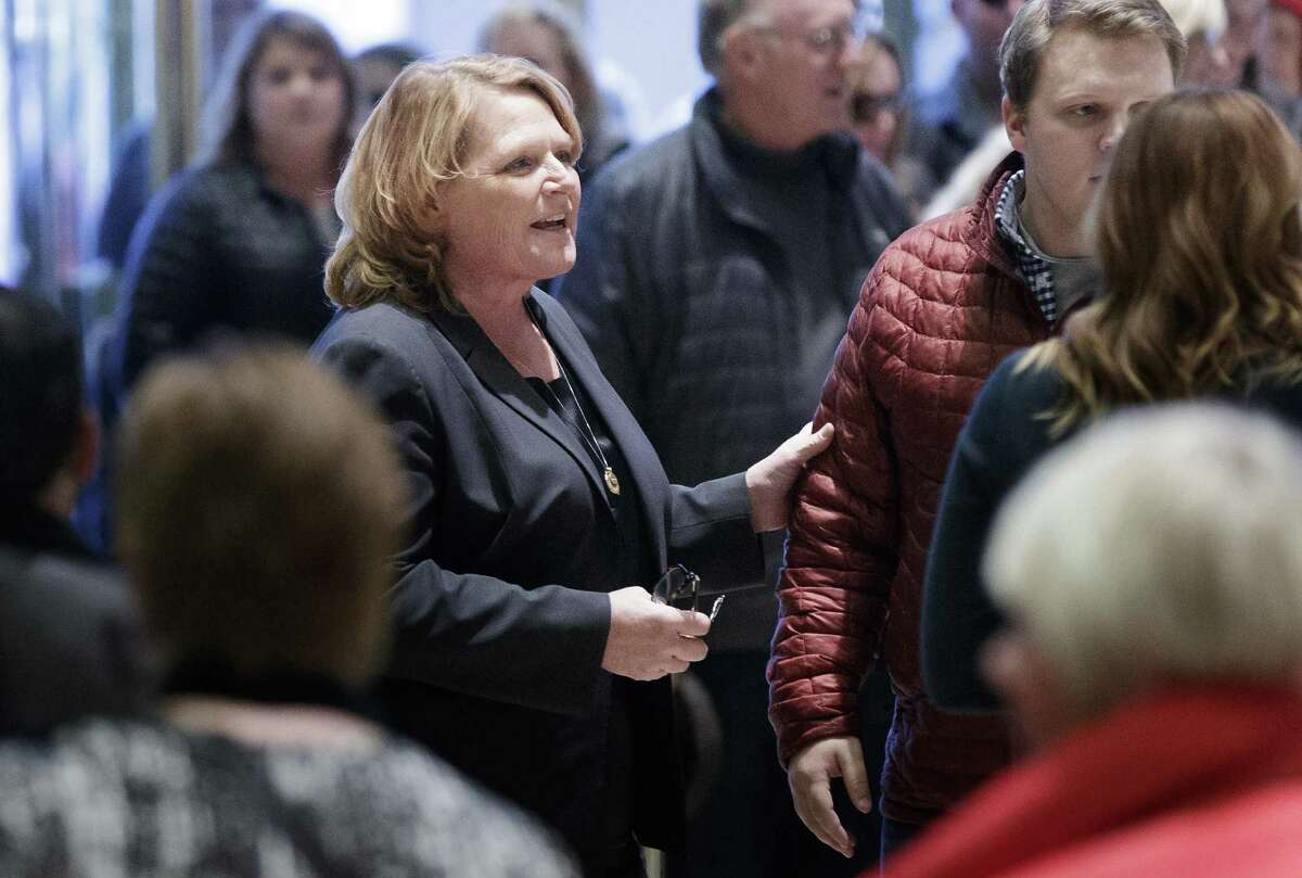 Senator Heidi Heitkamp, a Democrat from North Dakota, walks through the lobby at Trump Tower in New York, U.S., on Friday, Dec. 2, 2016. The Washington, D.C. attorney who assembled President-elect Donald Trump’s transition team fired a scathing email to Trump team members after hearing she was being vetted for Department of Agriculture secretary.