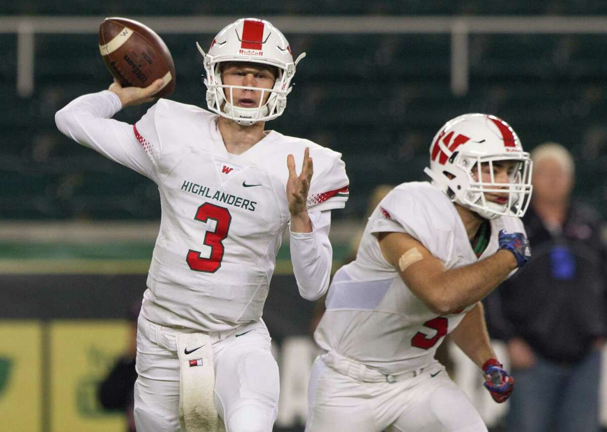 The Woodlands quarterback Eric Schmid (3) drops back to pass during the first quarter of a Class 6A Division I regional semifinal game at McLane Stadium Saturday, Nov. 26, 2016, in Waco. Schmid finished the first half 8-for-12 for 218 yards, two touchdowns and an interception, while rushing for 64 yards and a touchdown.
