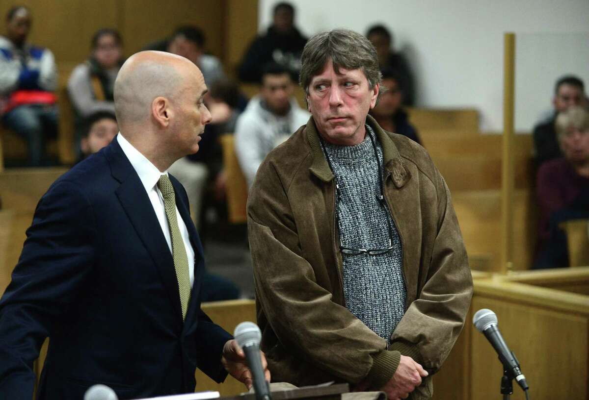 New Canaan resident Mark Lynch is arraigned in state Superior Court in Norwalk for manslaughter while accompanied by his attorney, Matthew Maddox, on Friday. Lynch allegedly gave his son, Chris Lynch, the heroin that killed him.