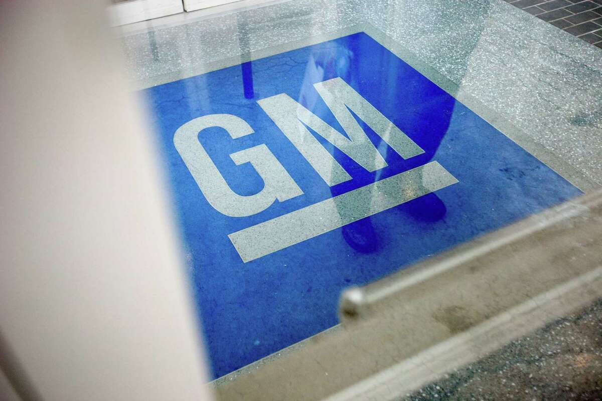 FILE - In this Thursday, Jan. 10, 2013 file photo, the logo for General Motors decorates the entrance at the site of a GM information technology center in Roswell, Ga. A congressional committee is investigating the way General Motors and a federal safety agency handled a deadly ignition switch problem in compact cars. House Energy and Commerce Committee Chairman Fred Upton of Michigan says the National Highway Traffic Safety Administration received a large number of complaints about the problem during the past decade. But GM didnÂ?’t recall the 1.6 million cars worldwide until last month. (AP Photo/David Goldman, File)