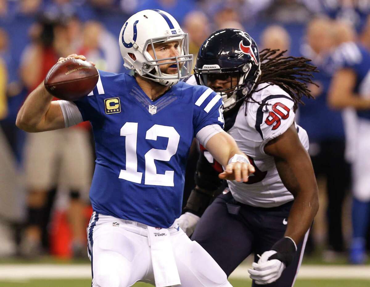 Texans defensive end Jadeveon Clowney, right, pressures Colts quarterback Andrew Luck into throwing an incompletion last Sunday.