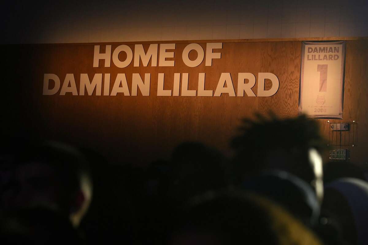 Damian Lillard's jersey is retired on the wall of the gymnasium at Oakland High School as he returns to his alma mater to throw release party for his new shoe with sponsor Adidas and to unveil improvements to the school�s gym, weight room and music program, at Oakland High School in Oakland, CA, on Friday, December 16, 2016.
