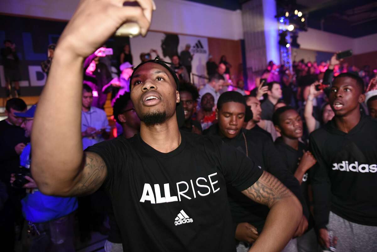 nba star damian lillard remains true   oakland roots