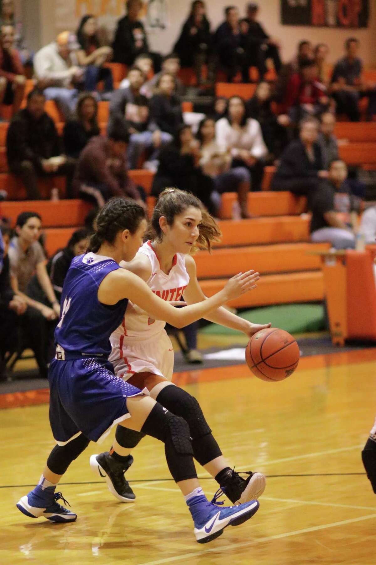 United’s Gabby Romero and the Lady Longhorns lost 66-64 at home to South San on Friday.