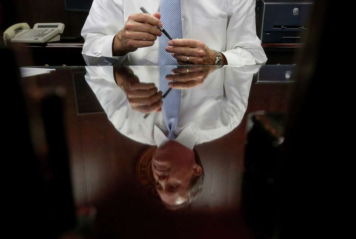 Texas Attorney General Ken Paxton works in his office Friday, Oct. 21, 2016, in Austin. ( Jon Shapley / Houston Chronicle )