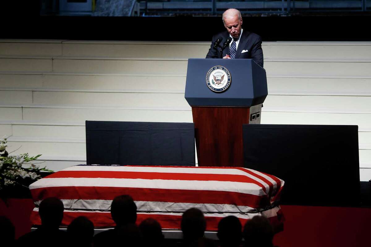 Vice President Joe Biden pauses as he speaks at the funeral of John Glenn at The Ohio State University, Saturday, Dec. 17, 2016, in Columbus, Ohio. Glenn, the famed astronaut, died Dec. 8 at age 95. (AP Photo/John Minchillo)
