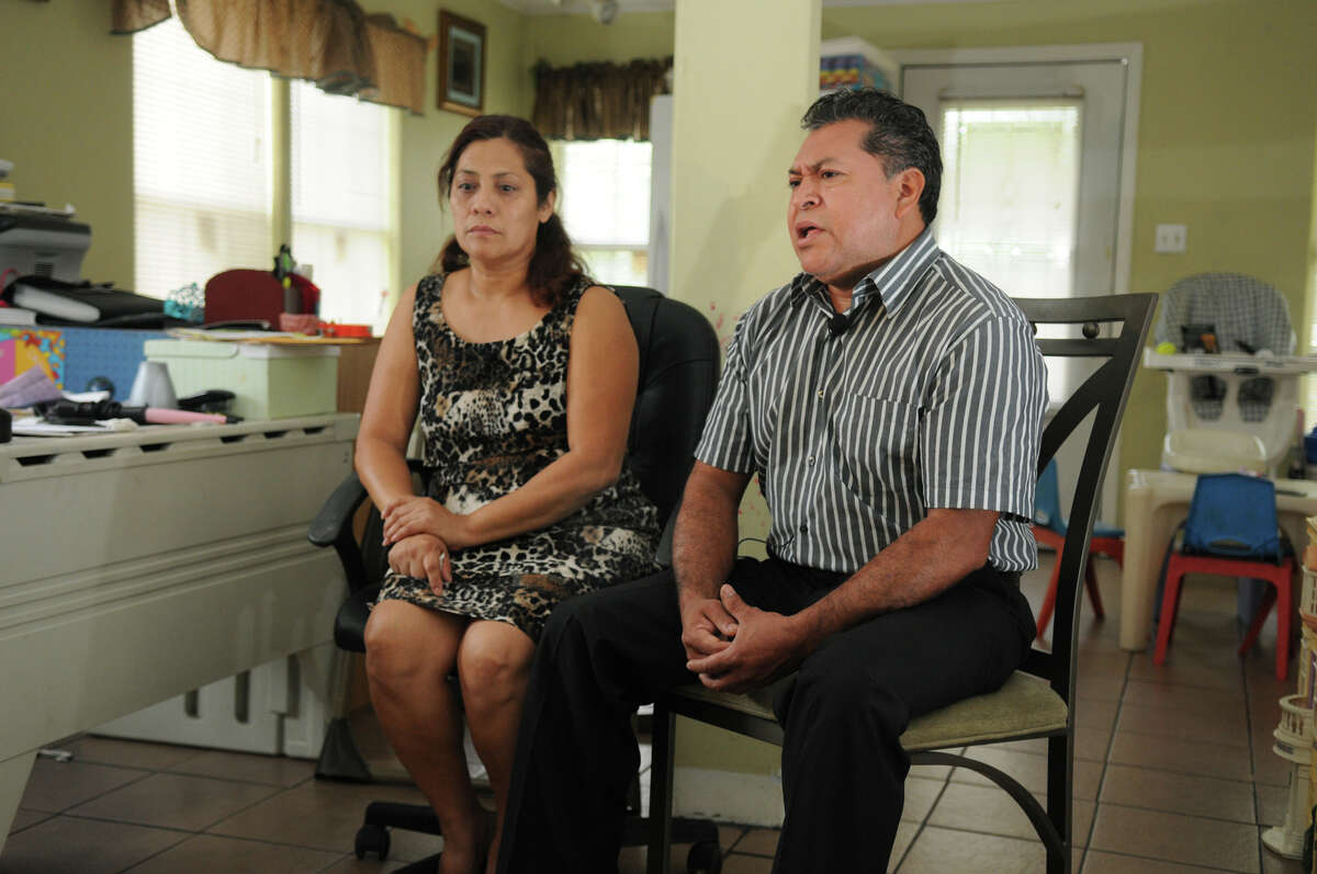 Jacqueline Rios, left, and Juan Cuyun of Conroe speak discuss the investigation into the circumstances surrounding the death of their son Russell.