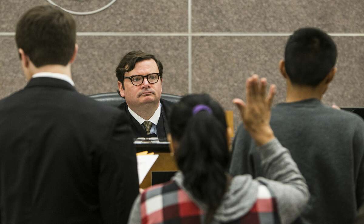 Judge Michael Schneider speaks to a juvenile appearing before him in the 315th Juvenile Court on Tuesday, Nov. 29, 2016, in Houston. ( Brett Coomer / Houston Chronicle )
