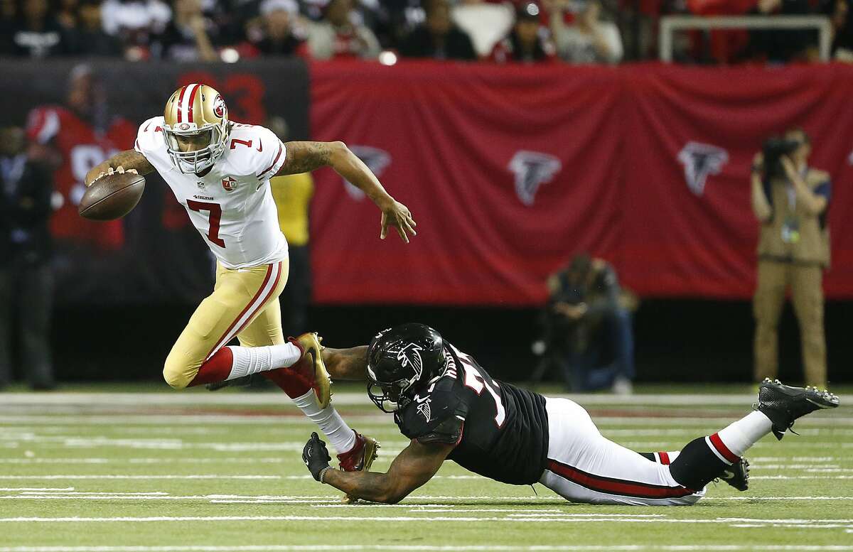 Atlanta Falcons defensive tackle Ra'Shede Hageman (77) sacks San Francisco 49ers quarterback Colin Kaepernick (7) during the second half of an NFL football game, Sunday, Dec. 18, 2016, in Atlanta. (AP Photo/Butch Dill)