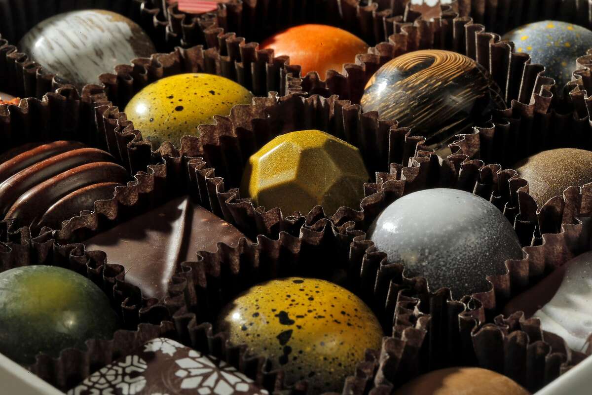 Various chocoalte truffles in a box made at Kollar Chocolates in Yountville, Calif., on Thursday, December 15, 2016. Chris Kollar is a self-taught chocolate maker who has a boutique chocolate shop specializing in hand-made chocolates The shop is filled with visually stunning chocolates and the chocolate is made on site.