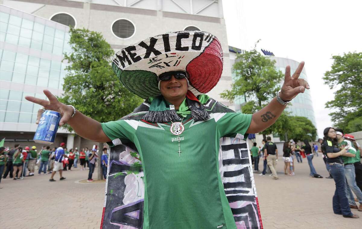 Fan Jesus Fuentes of San Antonio shows support for his team before the start of the United States-Mexico soccer match at the Alamodome on April 15, 2015.