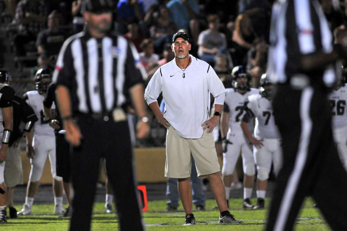 Vidor coach Jeff Mathews watches the officials as the Pirates take on the Nederland Bulldogs on Friday at Bulldog Stadium in Nederland. (Mike Tobias/The Enterprise)
