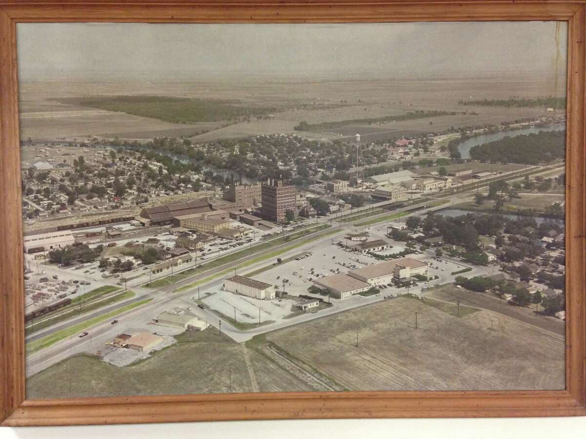 This aerial photograph take in 1956 circa is of Sugar Land when it was still a company town owned by Imperial Sugar. The picture was taken from the south/southwest. This picture along will other large pictures and drawings will be a part of an upcoming preservation project.