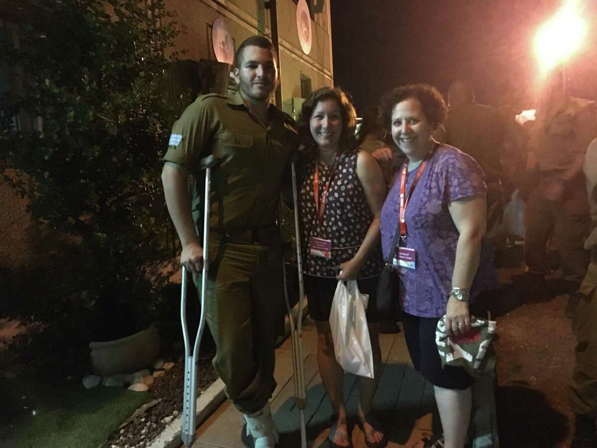 Leslie Komet and Barb Bikoff traveled to the Holy Land as part of an international women’s program. Among their encounters was a visit with Israeli soldiers. The San Antonio Jewish women, all mothers, brought gift bags to soldiers.