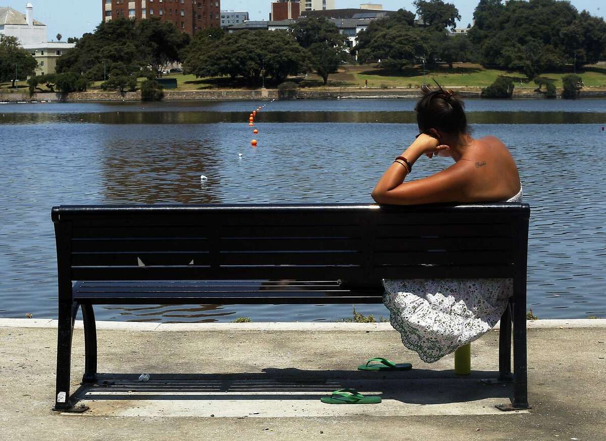 Taishi Duchicela does some research for work by Lake Merritt on Tuesday, July 02, 2013 in Oakland, Calif.